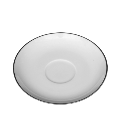 A white saucer with a platinum band around the rim.