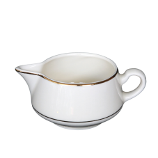 A creamer with decorative gold rings on and near the edge.