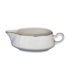 A gravy boat with with a decorative gold ring around the rim and handle.