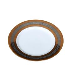 A 6 inch plate with metallic gold and silver rings around the outer edge.
