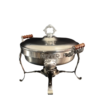A round, 6qt, stainless steel chafer with handles and a lid.