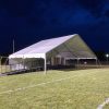 tent to cover stage with open front