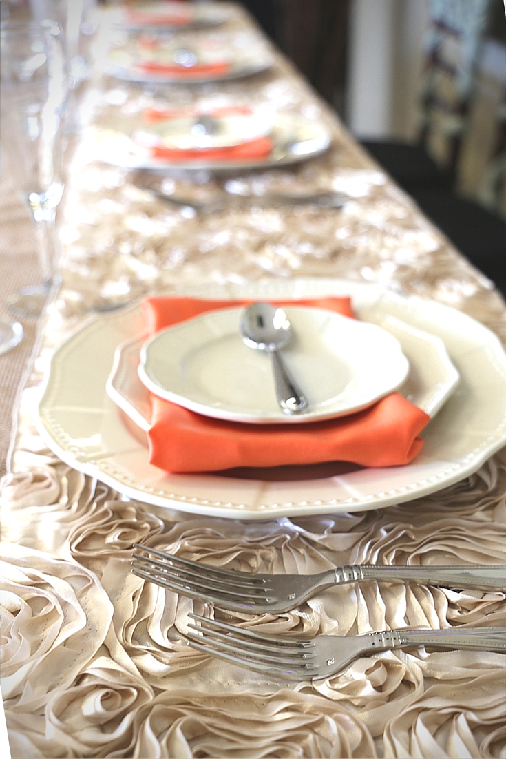 Orange and beige rose table setting