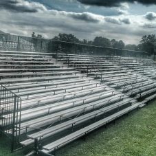 Rental bleachers in a custom set up for seating at a football game.