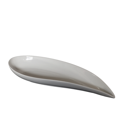 A white ceramic teardrop bowl.