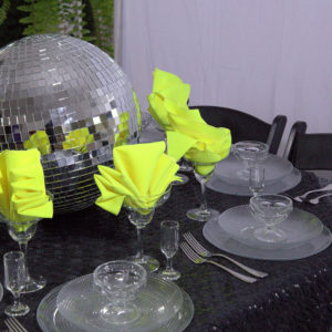 black and green linen place setting