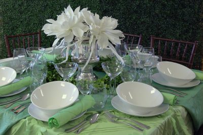white and green linen table setting