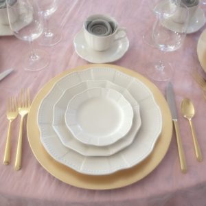 pink and gold linen place setting