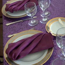 purple rental linen place setting