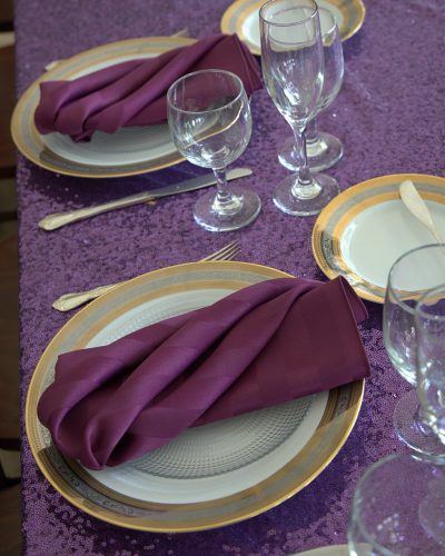 purple rental linen place setting