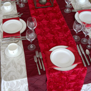 white and red linen place setting