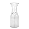 A 0.5 liter wine carafe with a decorative circular design on the front.