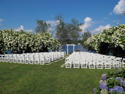 white resin chair rental wedding seating