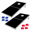 Two black fold up boards with two sets of red and blue bean bags for cornhole.