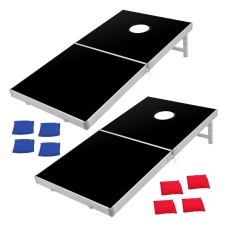 Two black fold up boards with two sets of red and blue bean bags for cornhole.