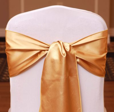 gold satin sash linen rental