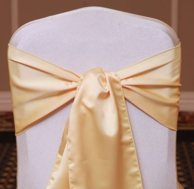 maize satin sash linen rental