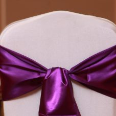 purple satin sash linen rental