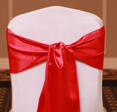 red satin sash linen rental