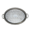 A stainless steel oval tray with an embossed design and handles.