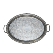 A stainless steel oval tray with an embossed design and handles.