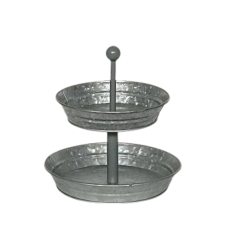 A rustic, two tier, galvanized, round tray.