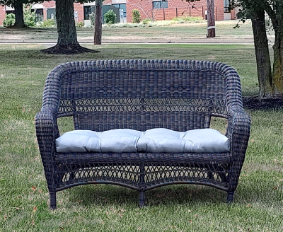 brown wicker settee loveseat with cushion