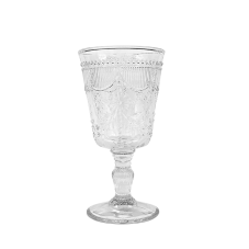A debutante goblet with abstract ornate patterns and flowers in the glass.