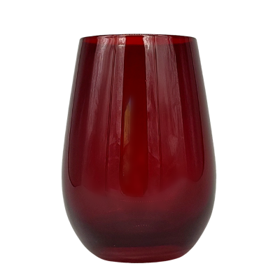 A red stemless wine glass.