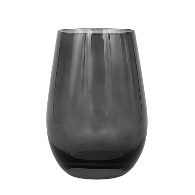 A smoke gray stemless wine glass.