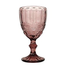 A vintage plum colored goblet with textured patterns on the cup.