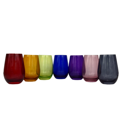 A series of stemless glasses in various colors; red, amber, green, blue, purple, lilac, and smoke.
