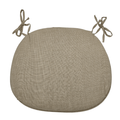 A beige-colored natural chair cushion with cloth ties on the back corners.
