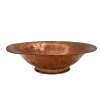 A fluted copper bowl viewed from the side. The edge of the bowl flares out.
