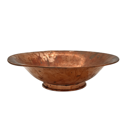 A fluted copper bowl viewed from the side. The edge of the bowl flares out.