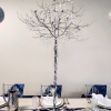 Silver Crystal Tree Centerpiece on a set table.