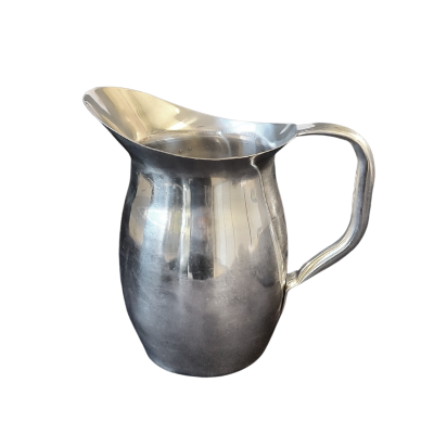 A stainless steel pitcher.