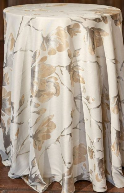 aria linen rental in gold pattern