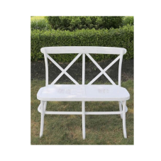 An unpadded rental bench in the rustic farm style for seating two, whitewash color with x-crossed backing.